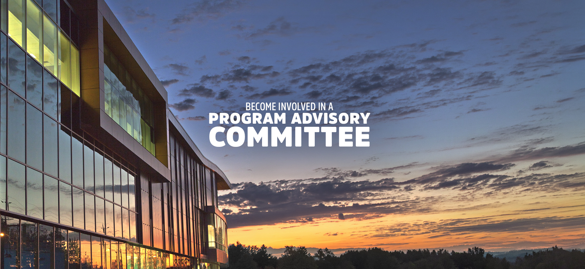 sault college building at night from outside with Become involved in a program advisory committee text overlay