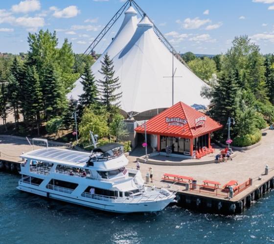 Waterfront with pavilion, Beaver Tails and Miss Marie around the boardwalk