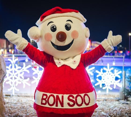 Bon Soo posed in front of winter decorations during carnival