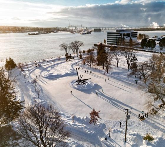Drone view of Clergue Skating Trail downtown on a sunny winter day