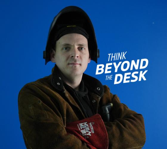 Skilled trades student photo with think beyond the desk
