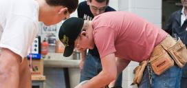 Student cutting lumber with skill saw