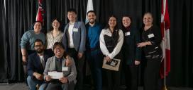 Group of students posing together with their awards